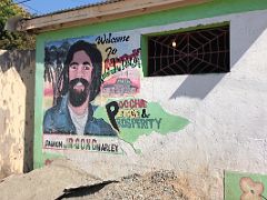 09A Welcome to Jamrock Poochie, Peace, Prosperity Damion Jr Gong Marley mural at 2nd Street and Collie Smith Dr Trench Town Kingston Jamaica